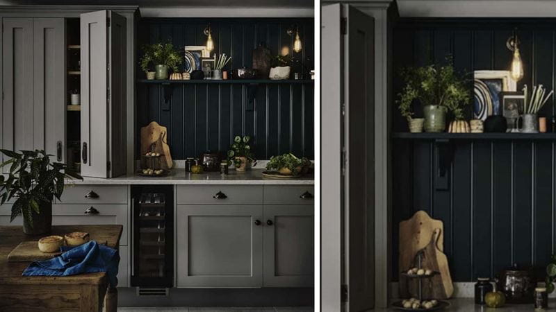 A kitchen with black details by John Lewis of Hungerford