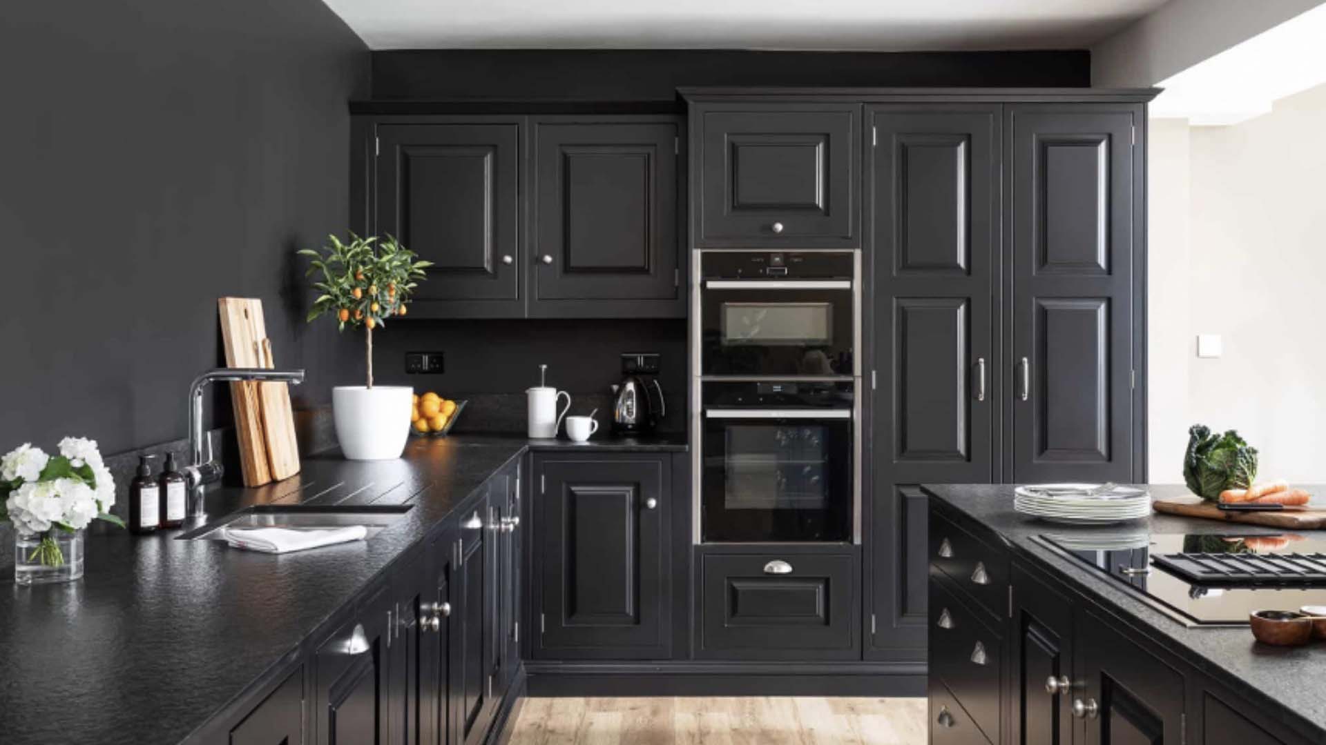 A tailored black kitchen by John Lewis of Hungerford