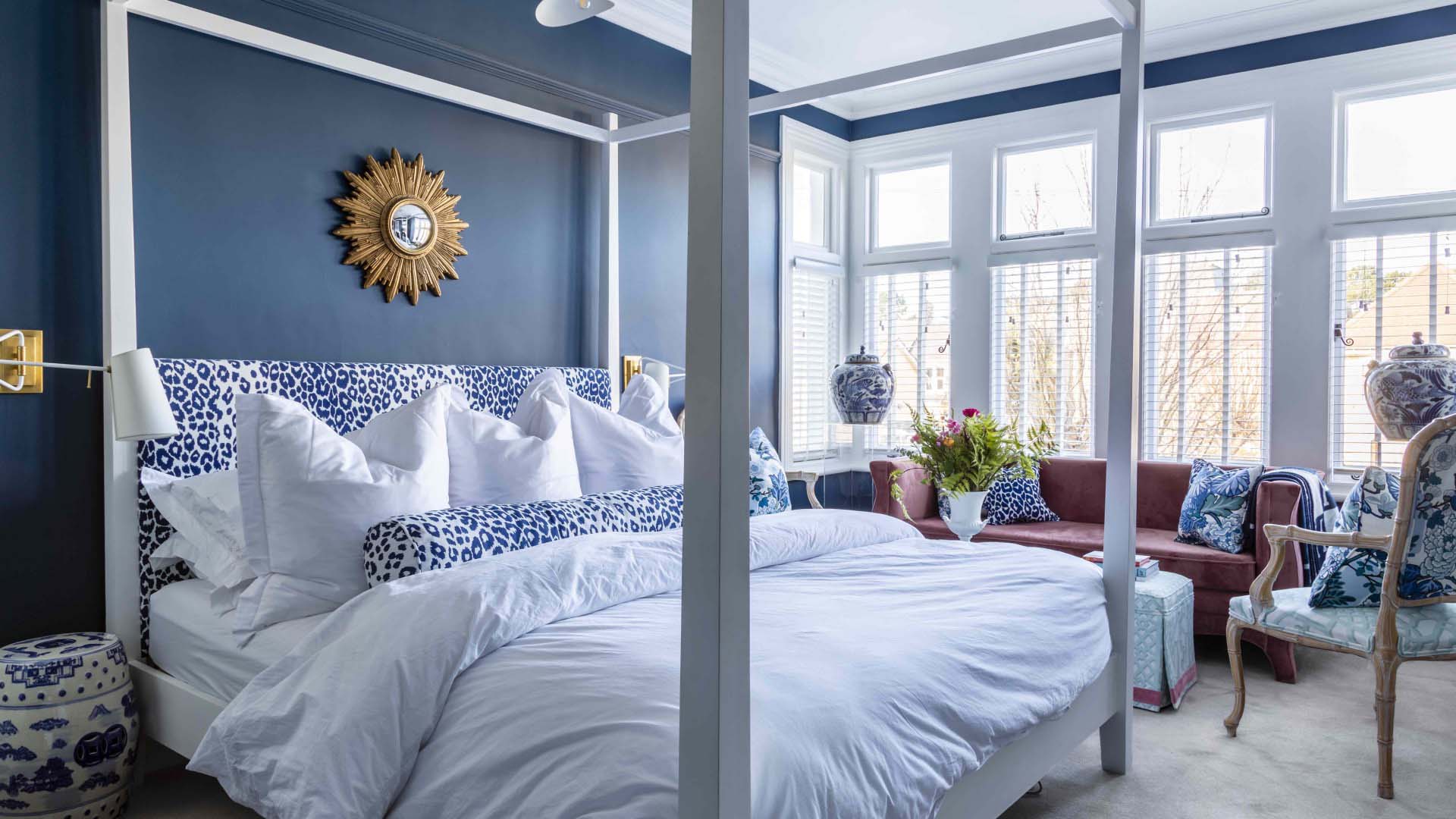 Large bedroom with a four poster bed