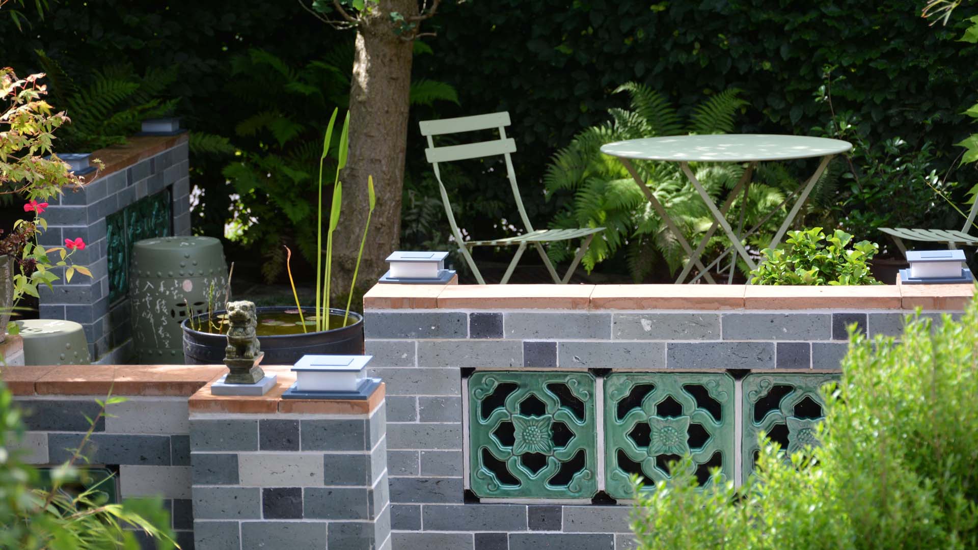 a low wall to divide the garden up