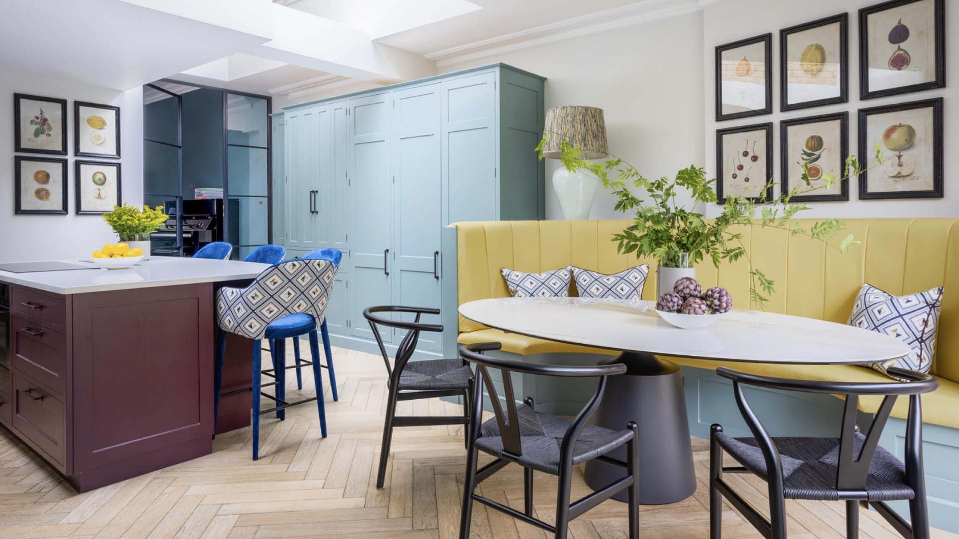 A kitchen painted in cheerful colour zones never looks tired