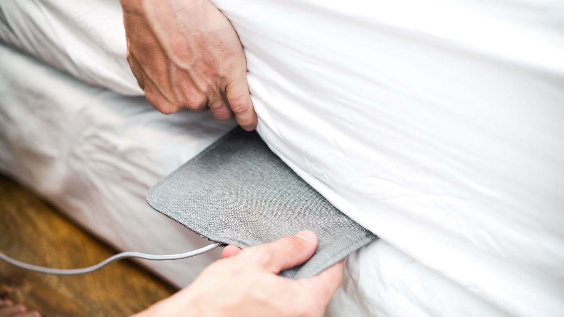 A sleep tracking mat is an alternative to wearing a sleep tracker in bed