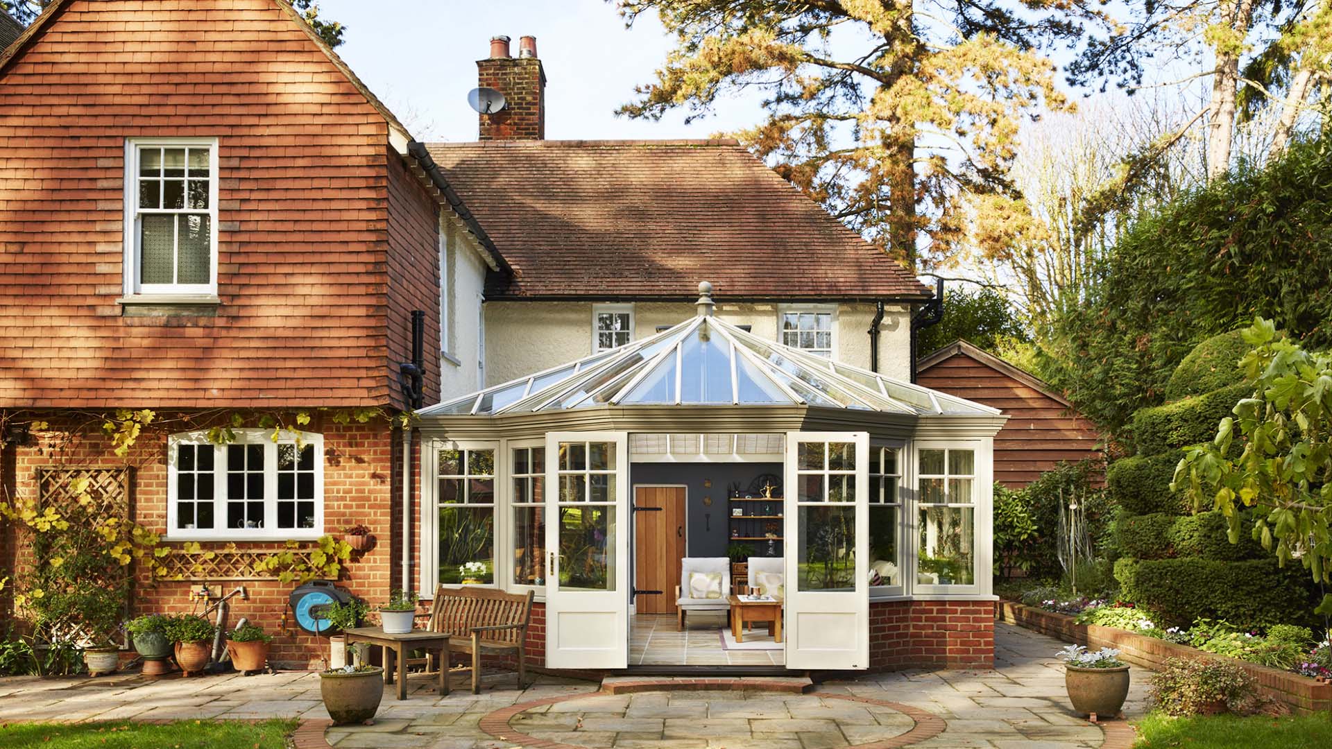 Save valuable green space and add your conservatory to an empty corner