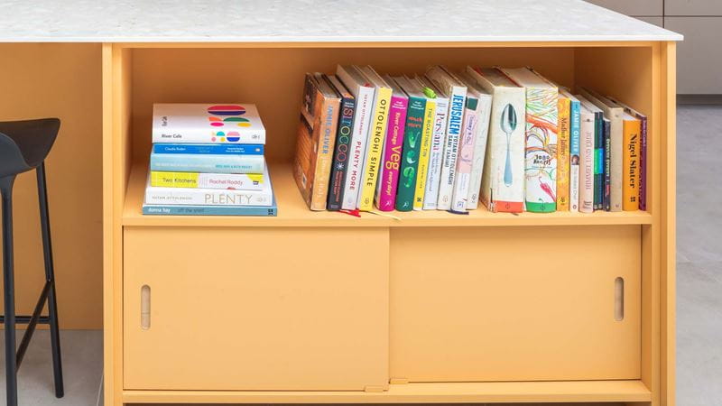 Only keep the cookery books you use on a regular basis. Otherwise, photograph recipes you love, then give the books away to charity.