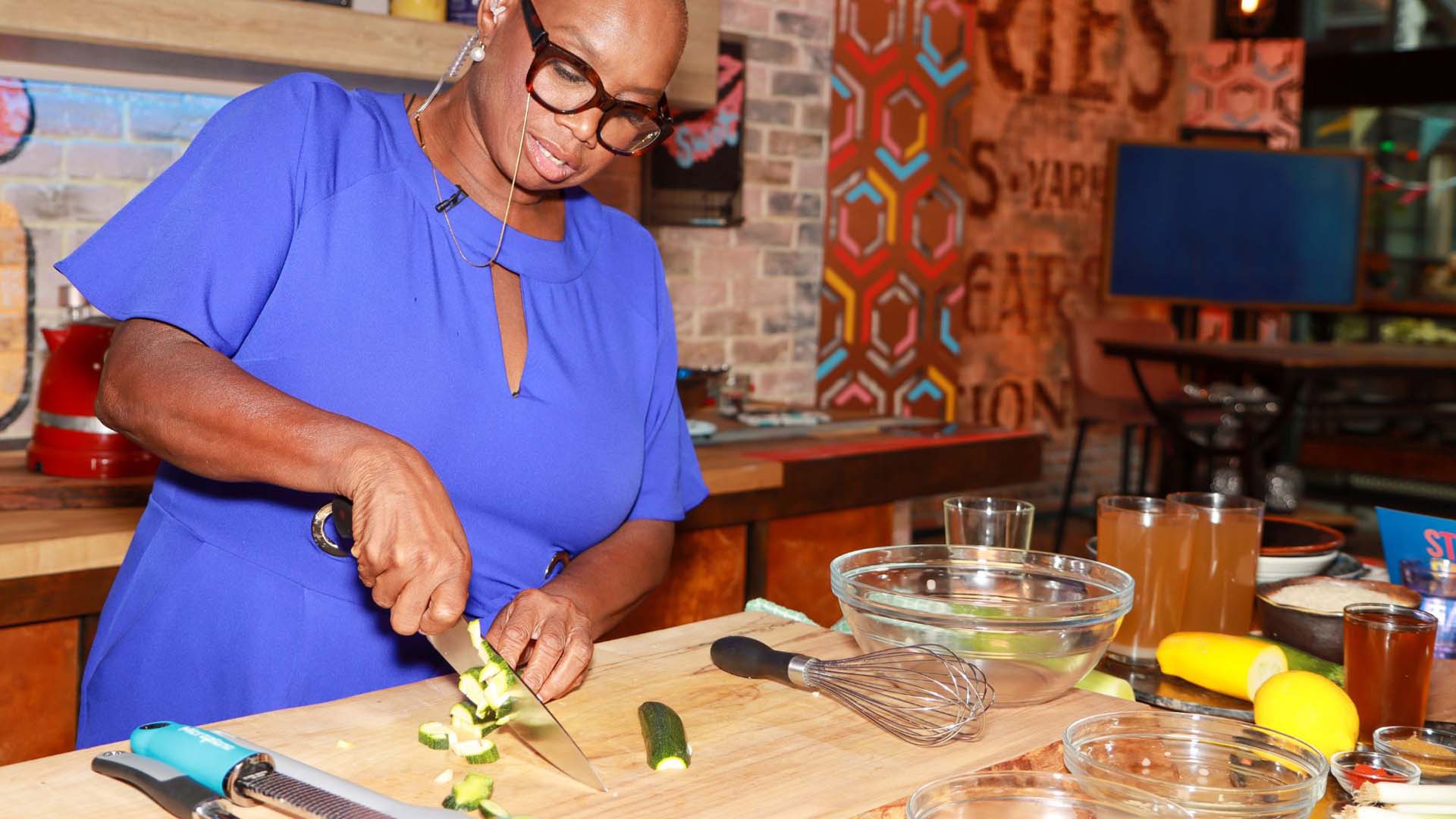 Andi Oliver preparing food