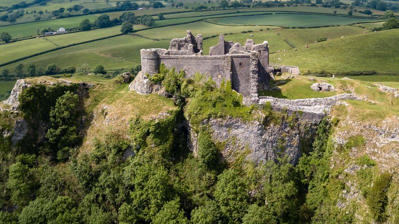 Cerreg Cennen Castle is perched on a cliff top