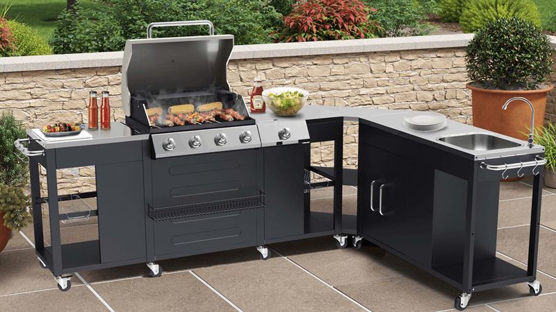A modular, outdoor kitchen unit on wheels in an 'L' shape.
