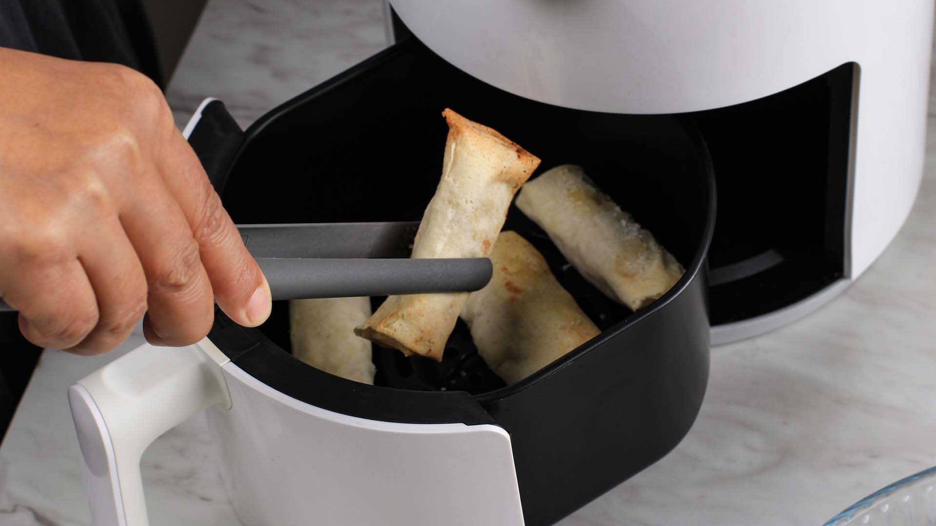 Cooking tongs in an air fryer