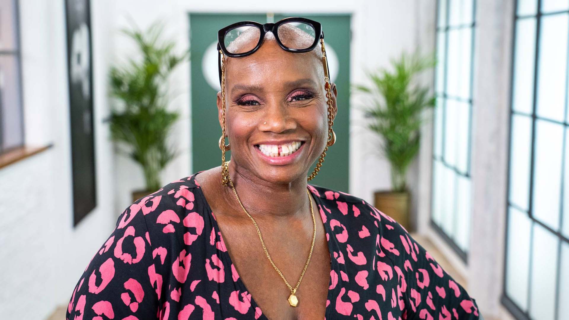 Andi Oliver smiling for the camera
