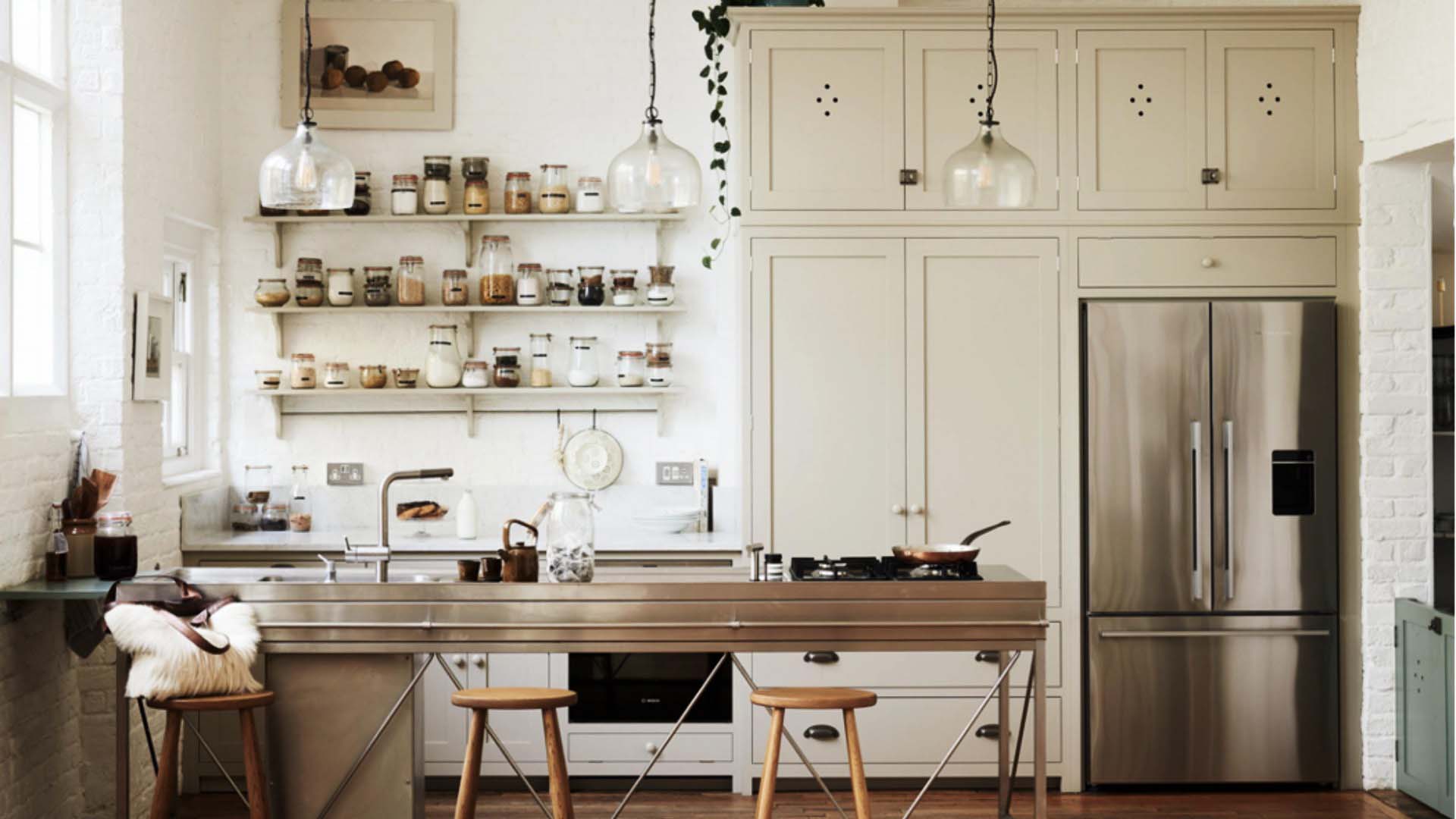kitchen with white shelves and a breakfast bar