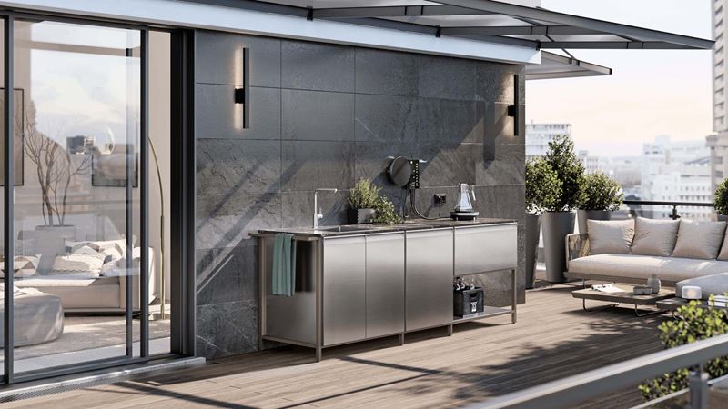 steel outdoor kitchen unit on a patio balcony