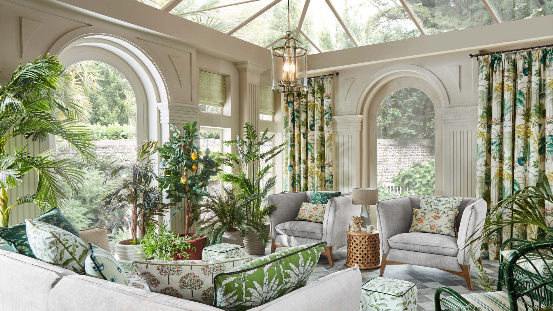 Interior of a conservatory with plants and furniture