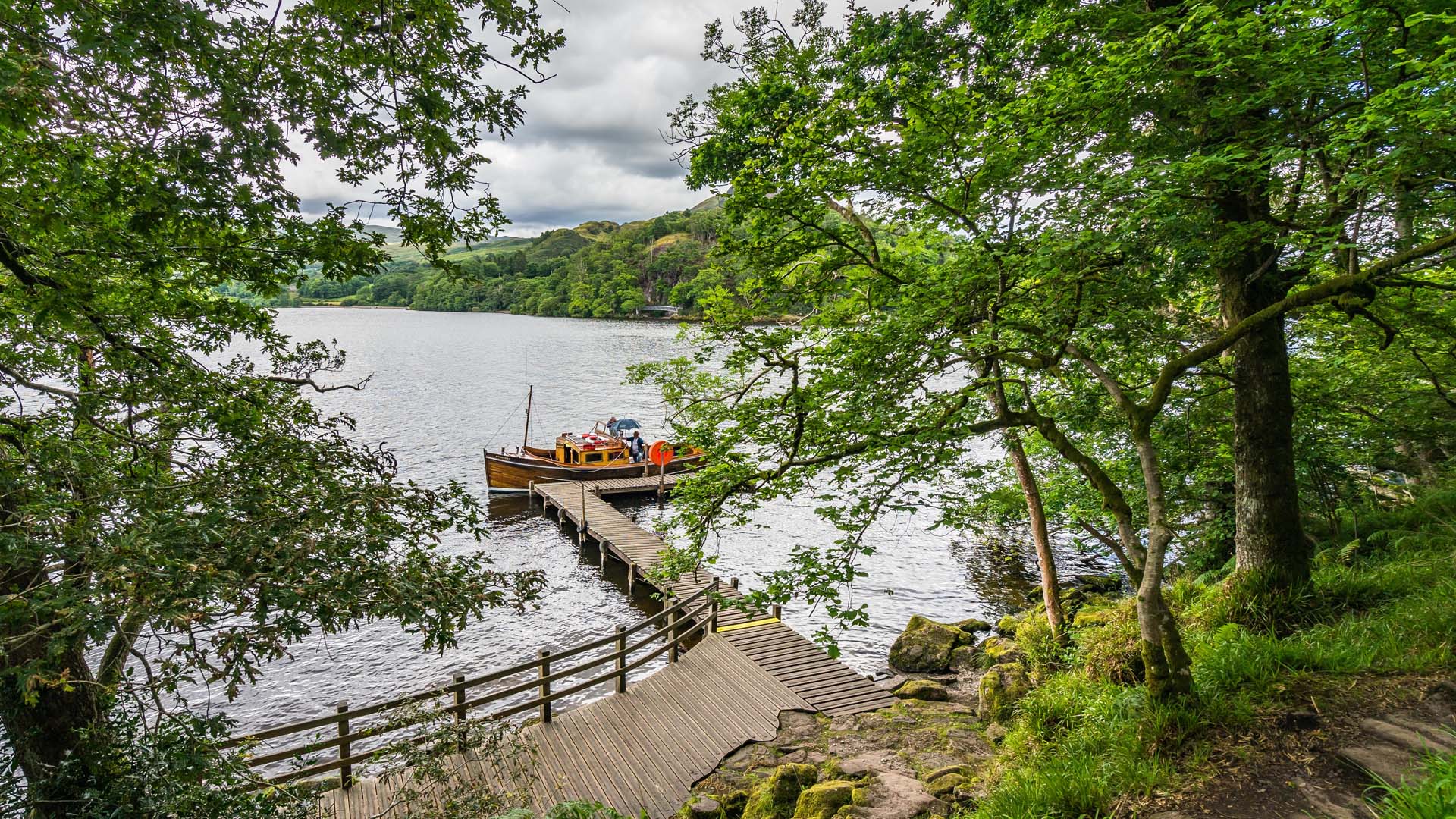 A view of a small island harbour with a boat at the jetty