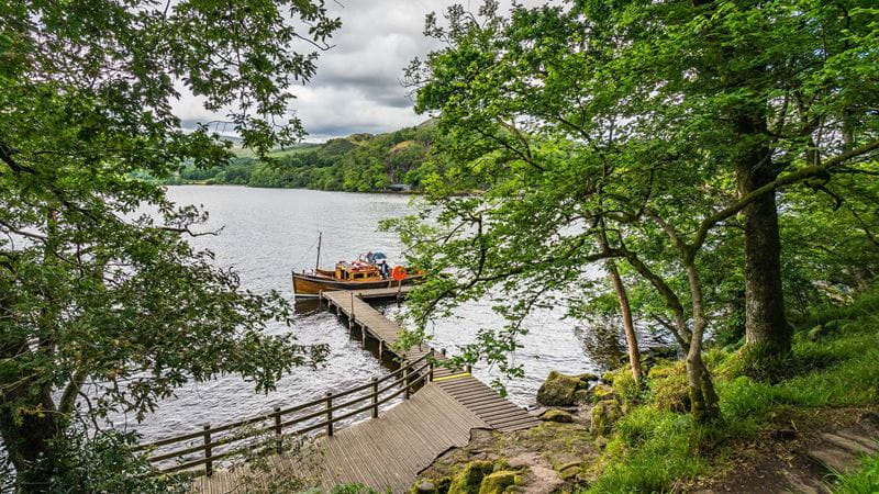 A view of a small island harbour with a boat at the jetty
