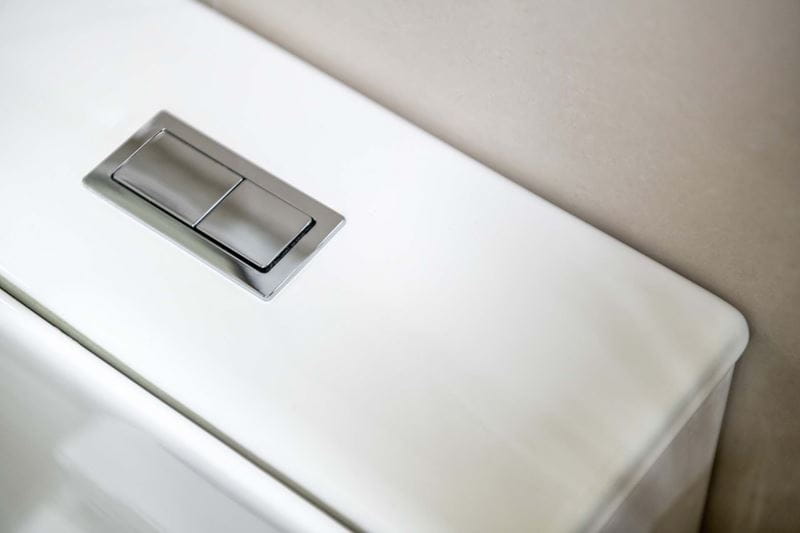 The cistern of a dual flush toilet