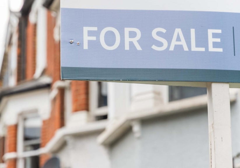 For Sale signs displayed outside terraced houses in Harringay Ladder, London