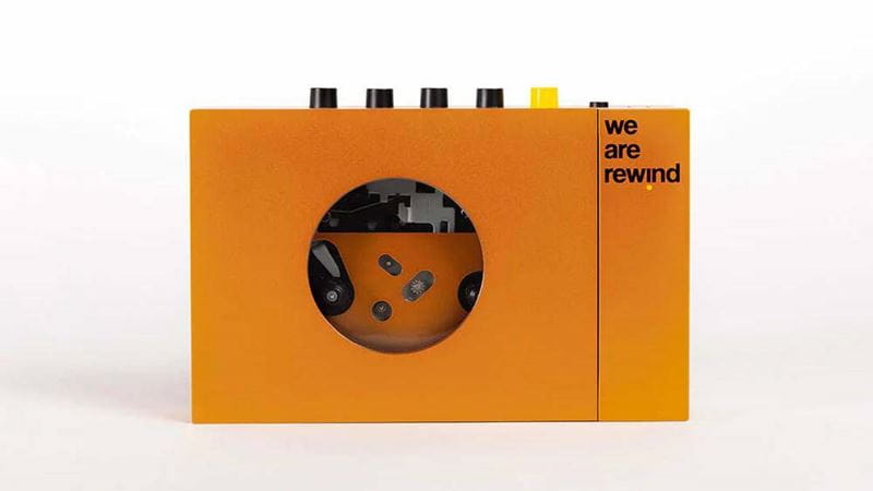 Orange cassette tape player by We Are Rewind