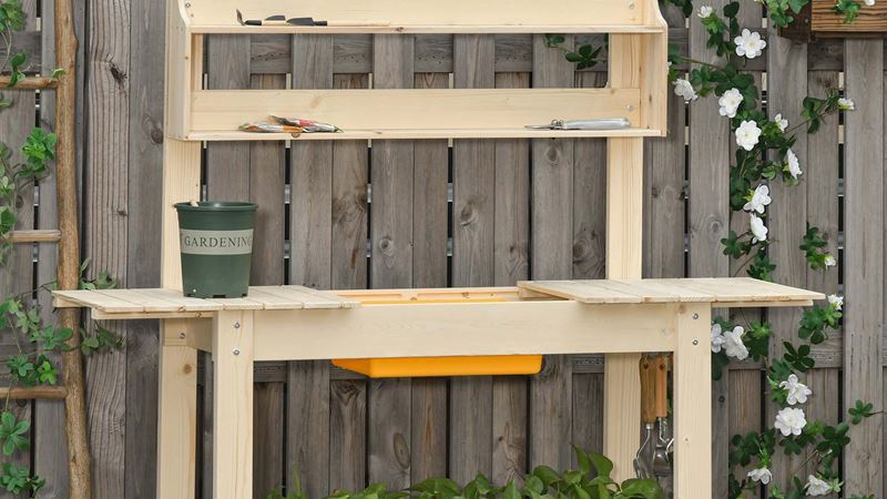 A basic outdoor sink made from unfinished wood