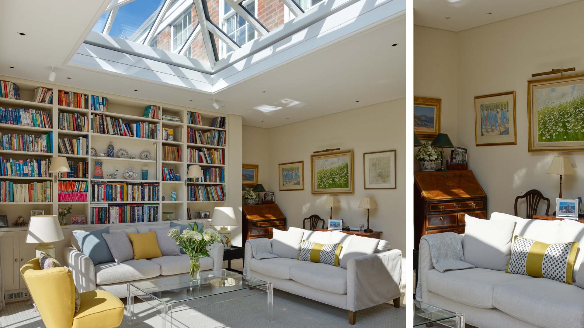 conservatory with floor to ceiling bookshelves and bureau to side