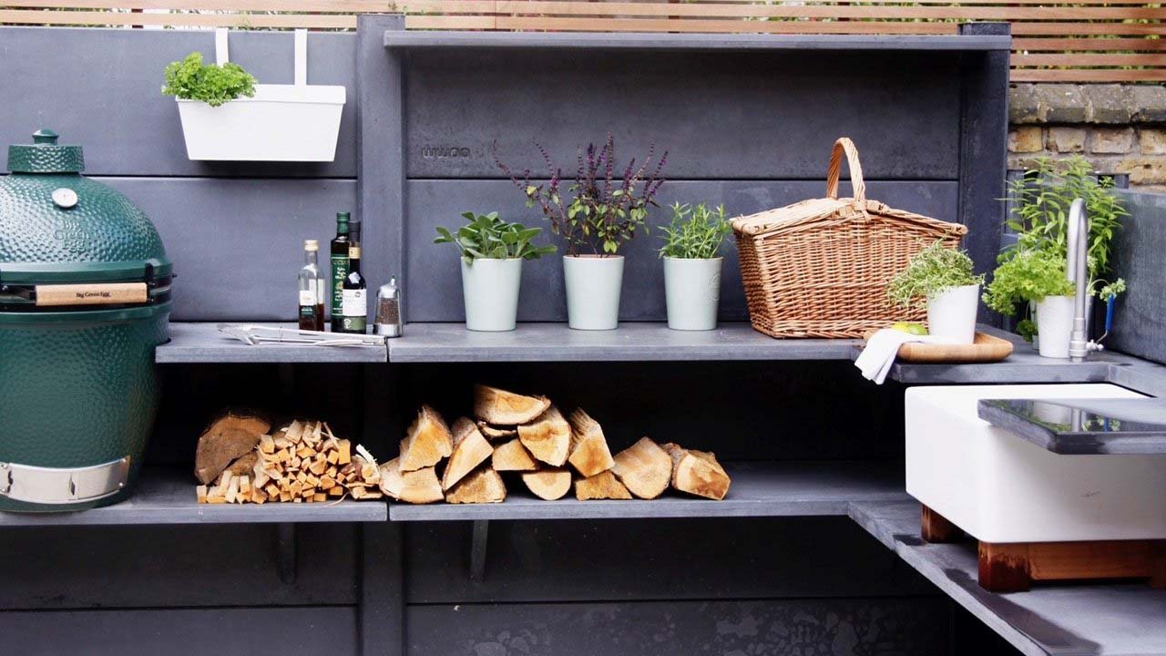 A blue outdoor sink with shelves