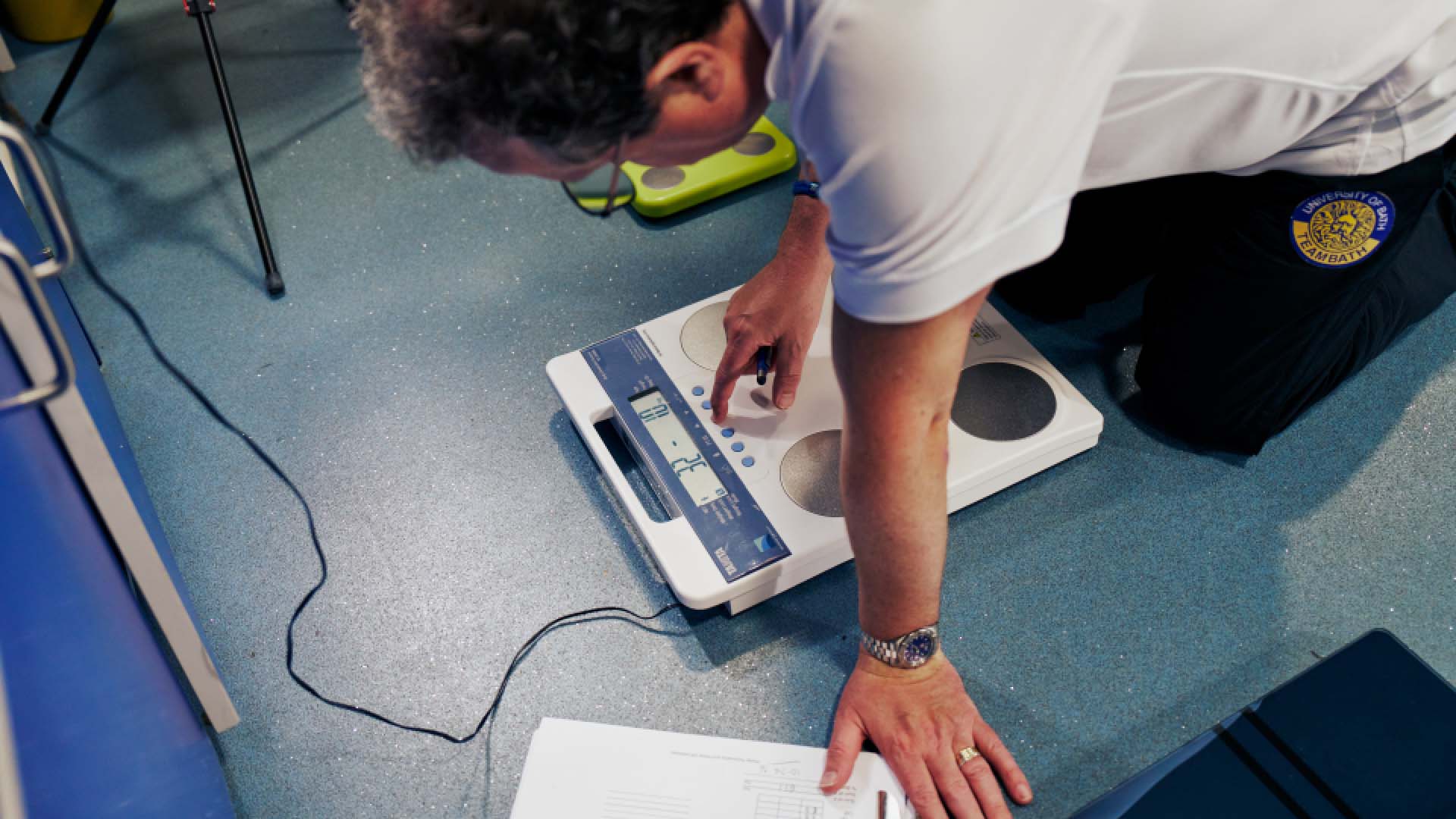 Jonathon Robinson of Bath University calibrating a set of smart scales