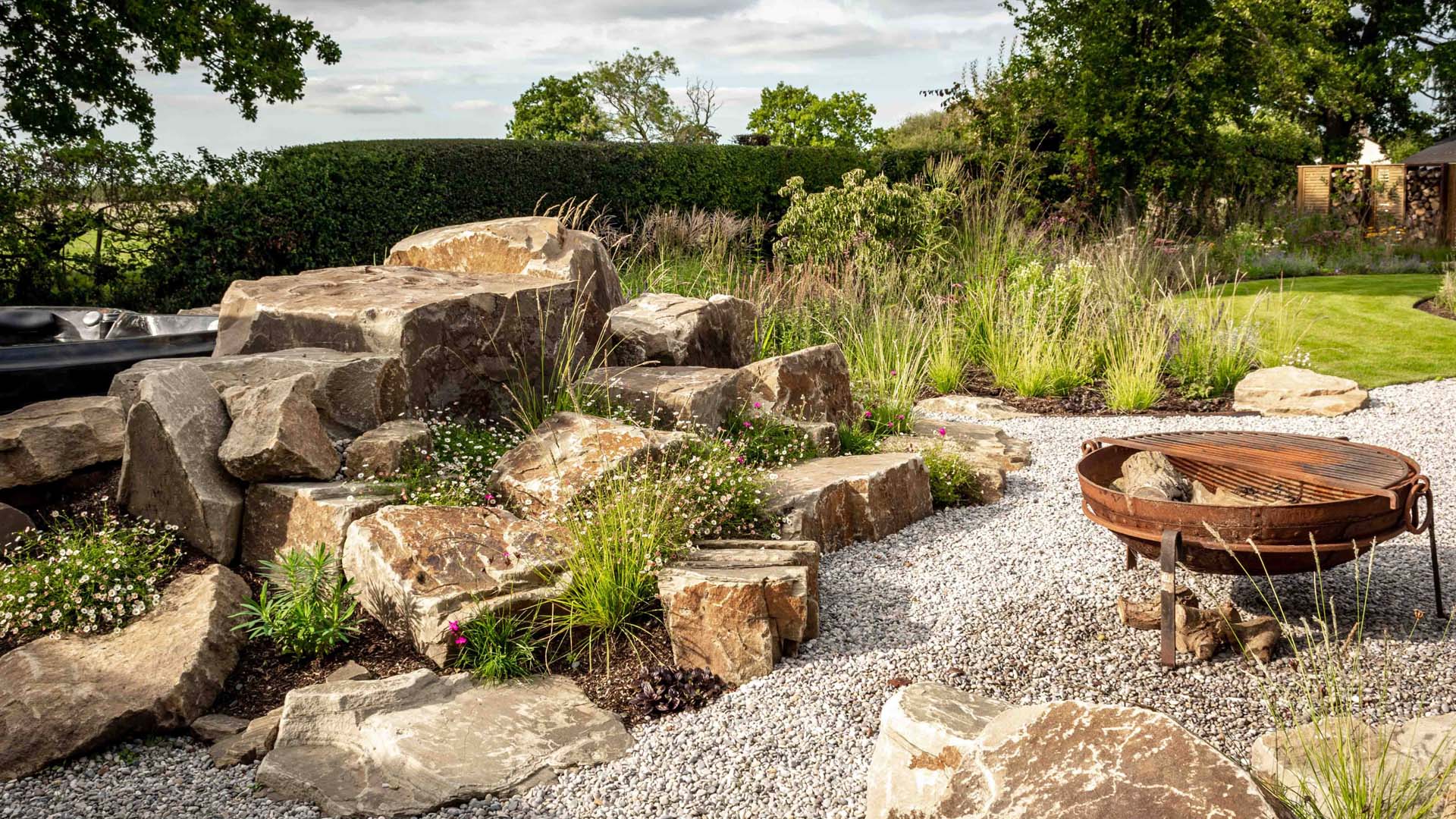 Rockery cleverly concealing a hot tub