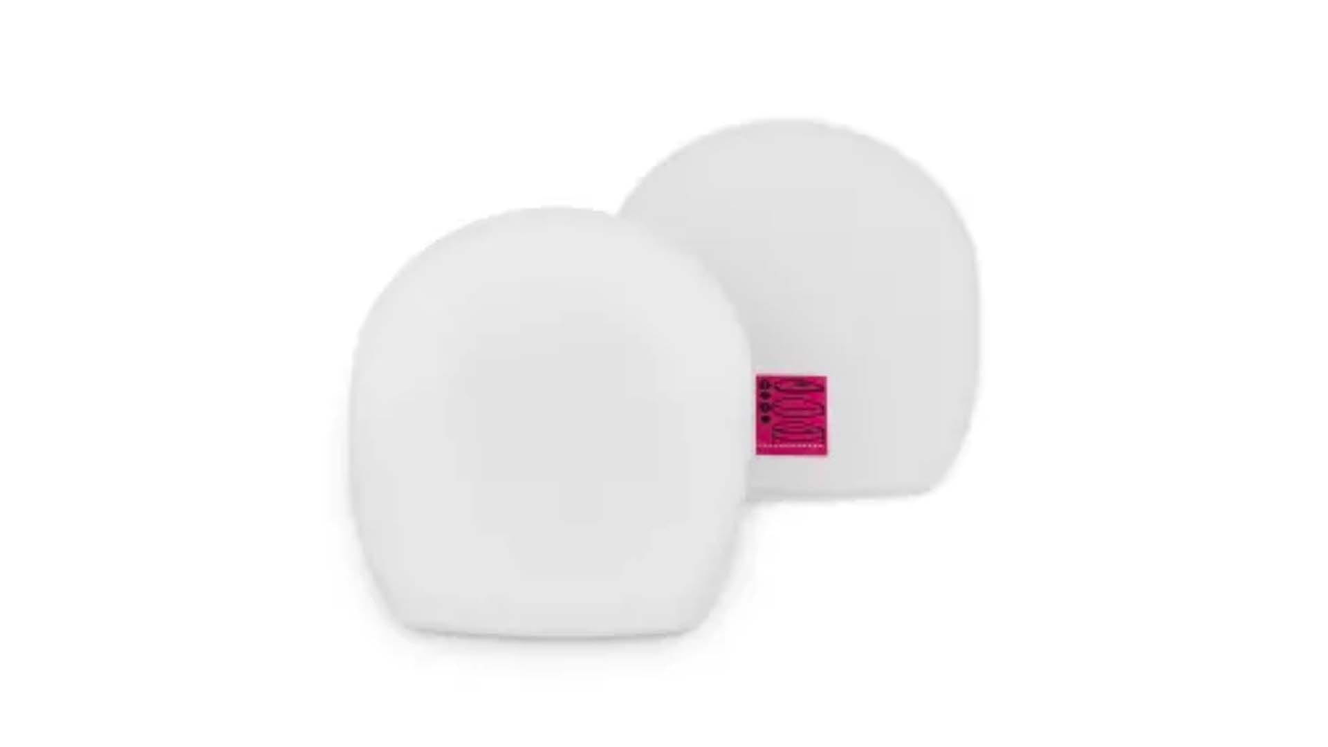 Two white Shark filter pads