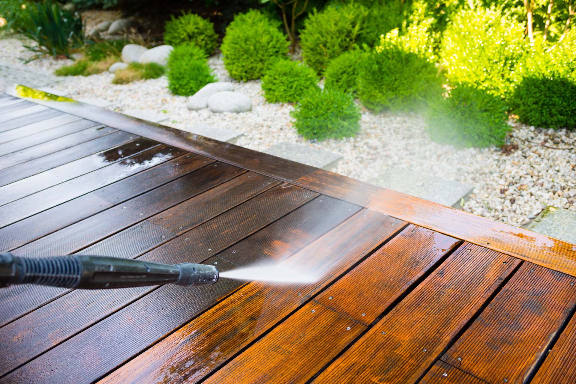 Using a pressure washer to clean grubby decking