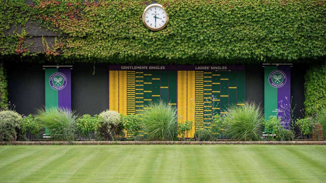 View of the Order of Play boards showing last year’s winners on the exterior of Centre Court at the All England Lawn Tennis Club