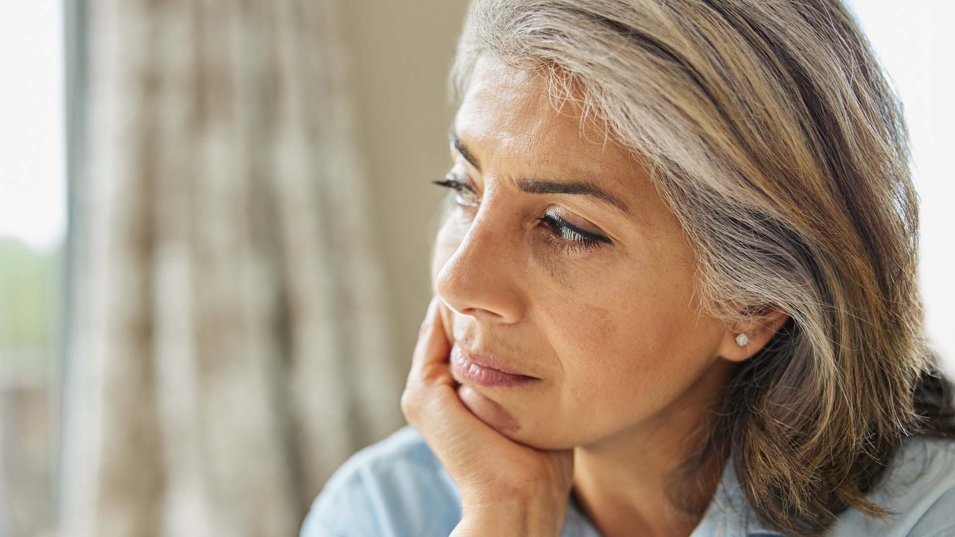 Woman looking anxiously to the right