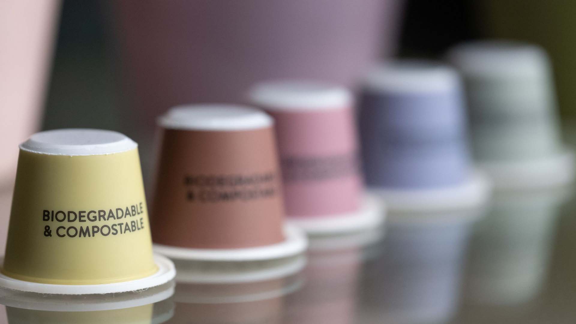 Close-up of biodegradable and compostable coffee pods in a range of colours.