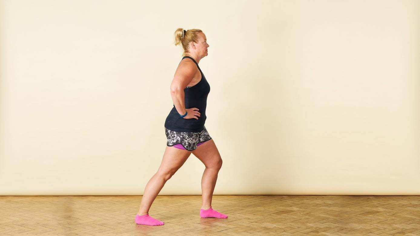 woman doing a calf stretch