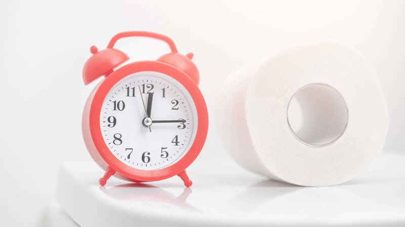 Clock and toilet paper