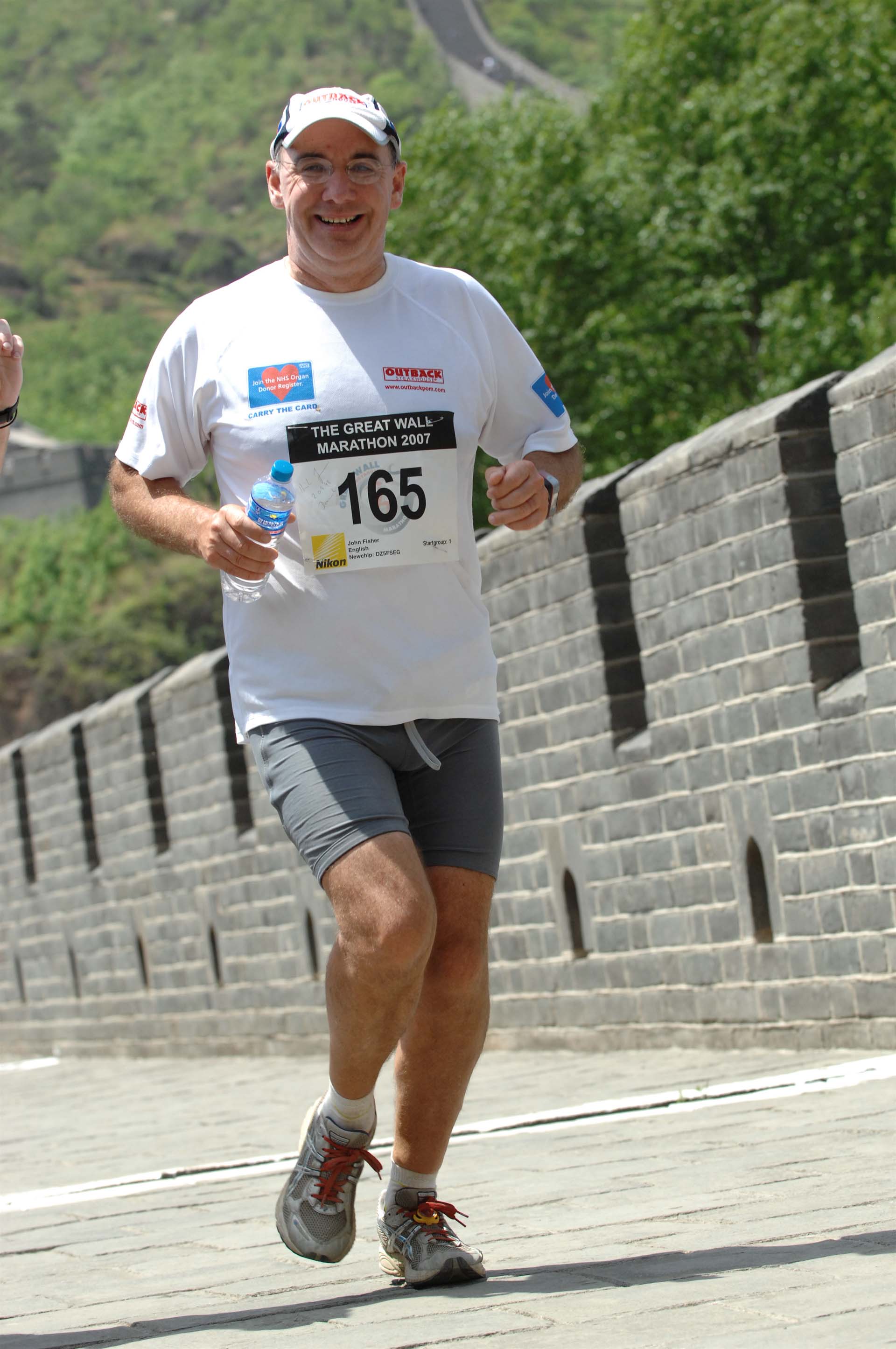 John Fisher running the Great Wall of China