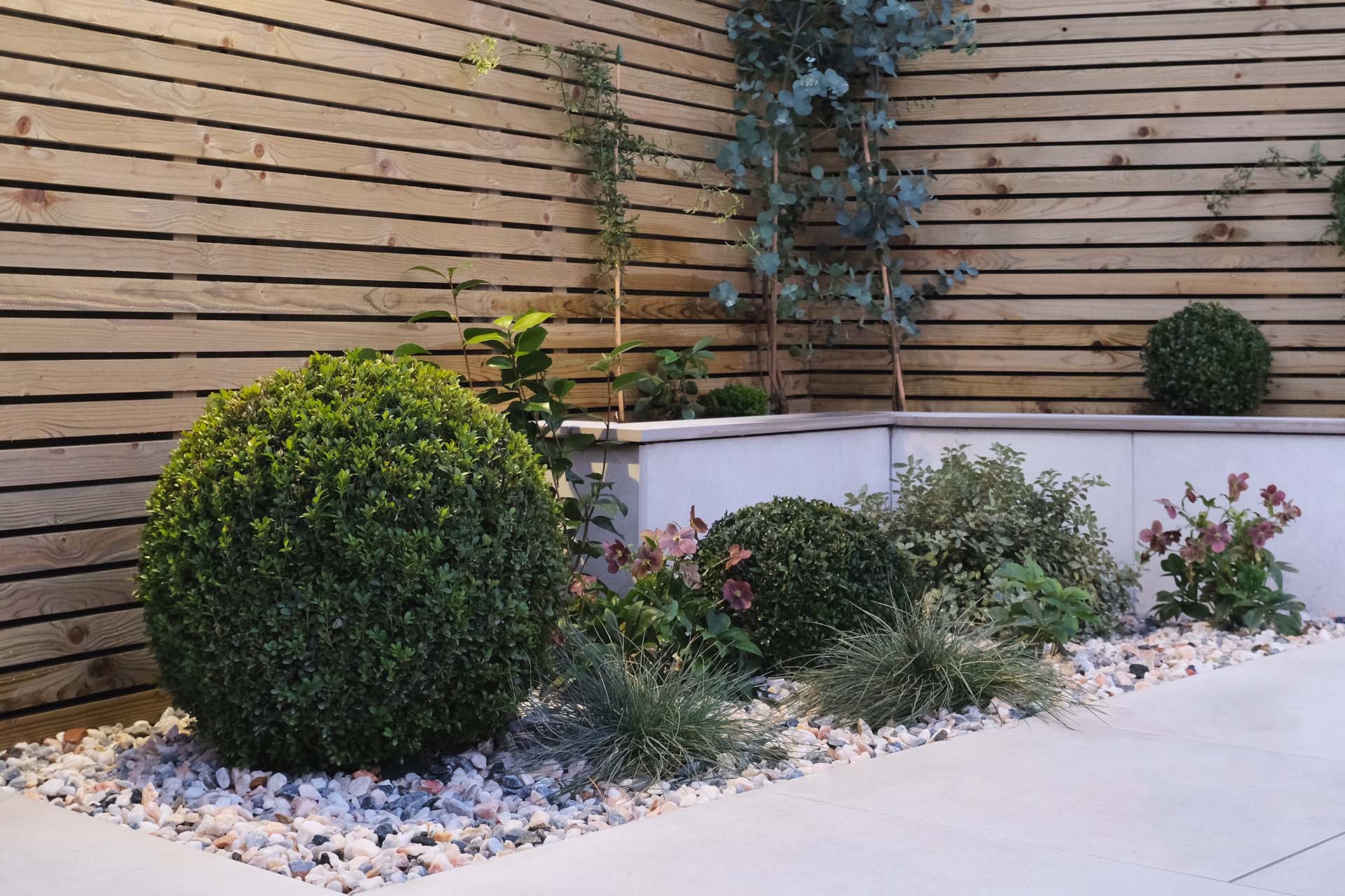 Pea gravel in a flowerbed