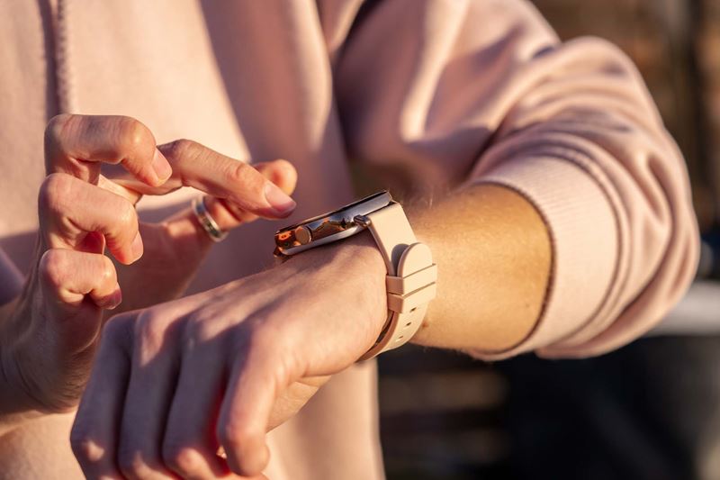 A woman checking her step counting watch