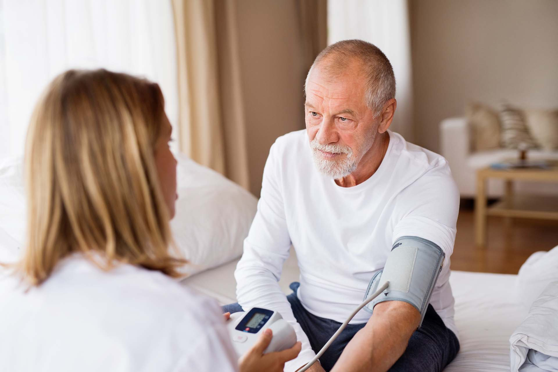 A man having his blood pressure tested