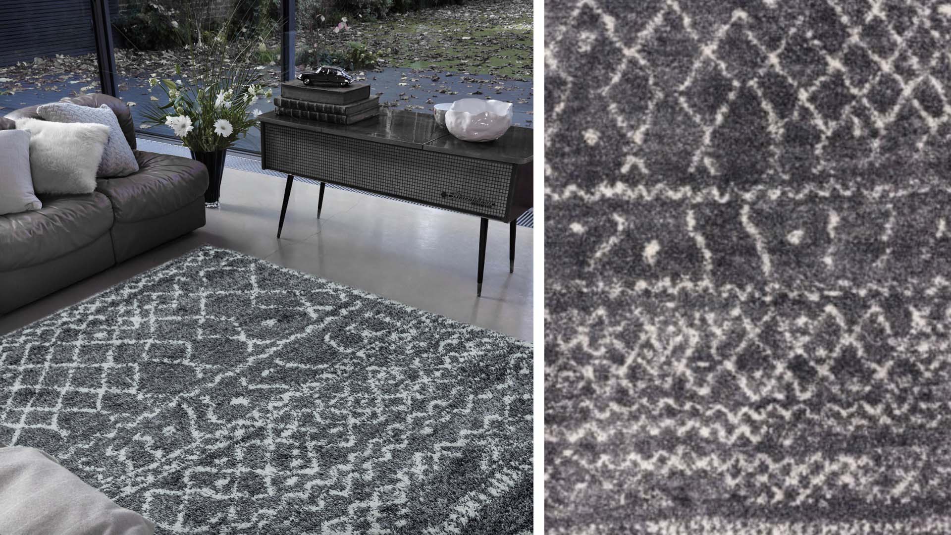 A black statement rug in a modern living room