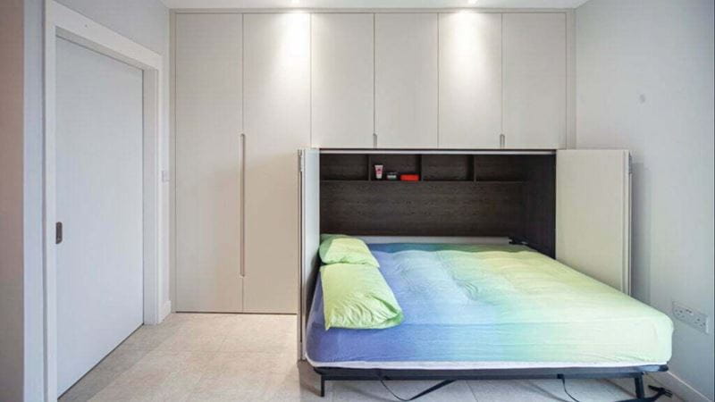 pull down bed concealed in the wardrobe