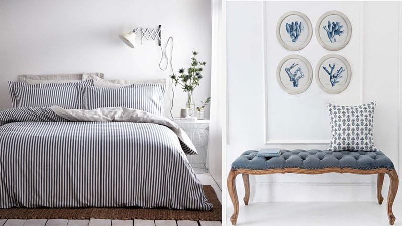 Side-by-side images of a double bed with striped navy bedding, beside a navy upholstered bench seat with coral prints framed above.