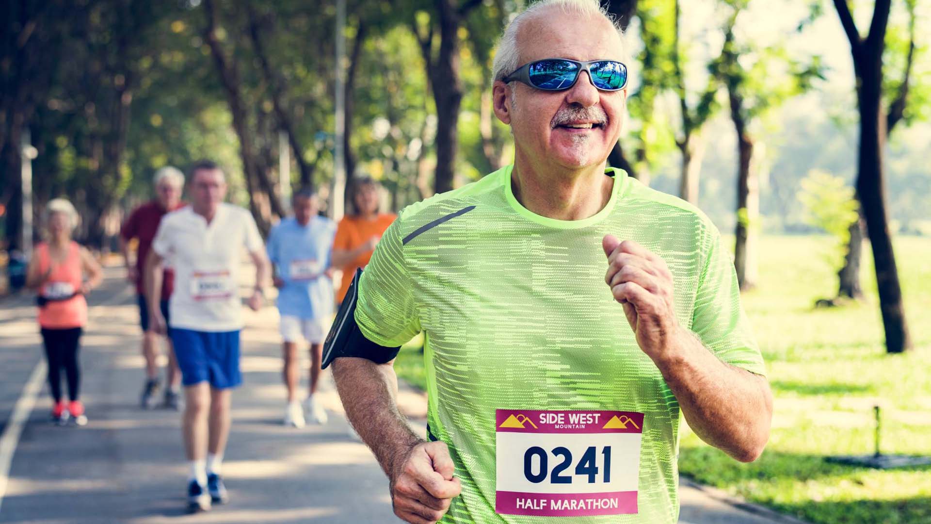 A man happily runs a half-marathon