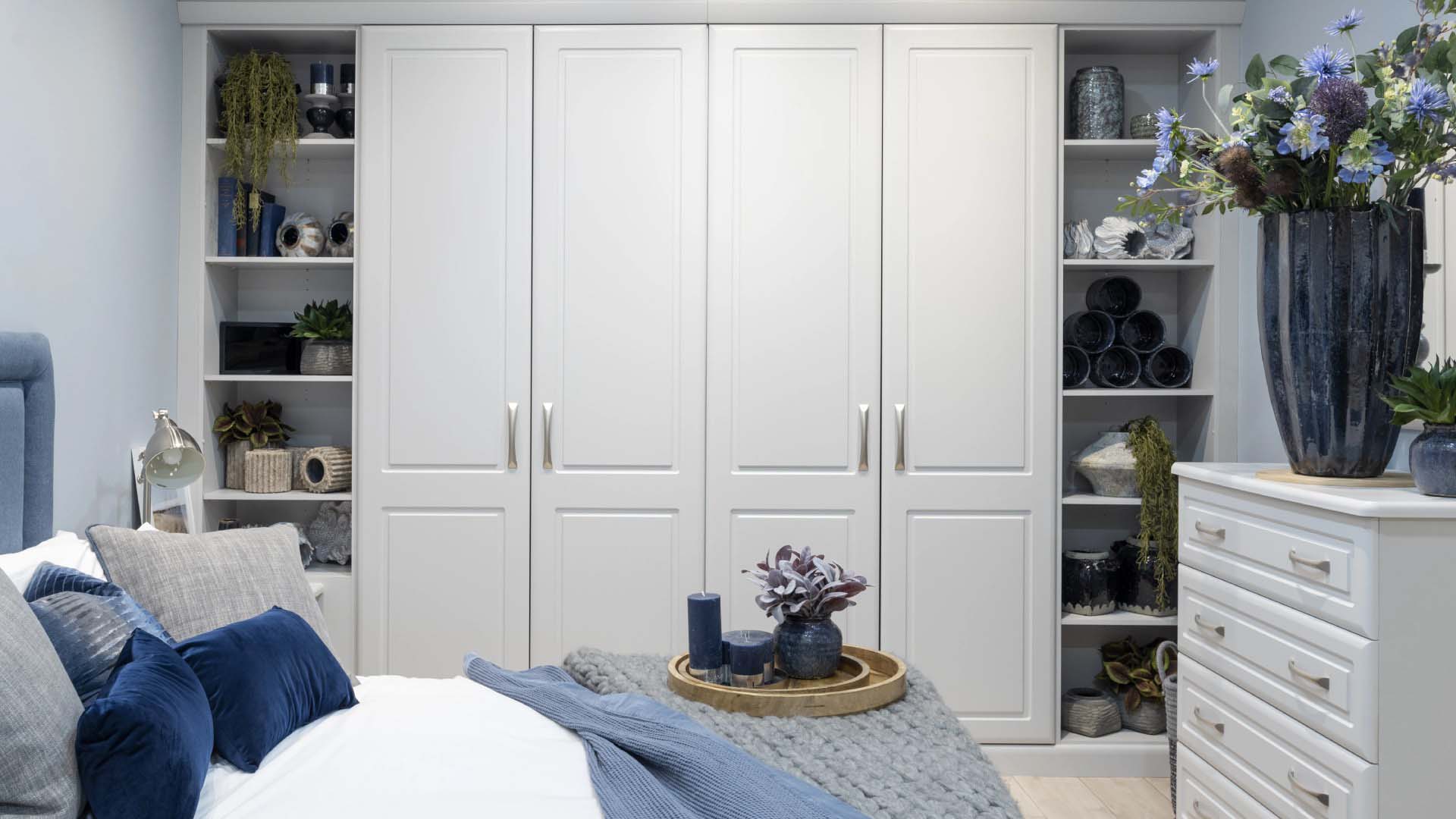 sliding doors on a large wardrobe built in to the bedroom