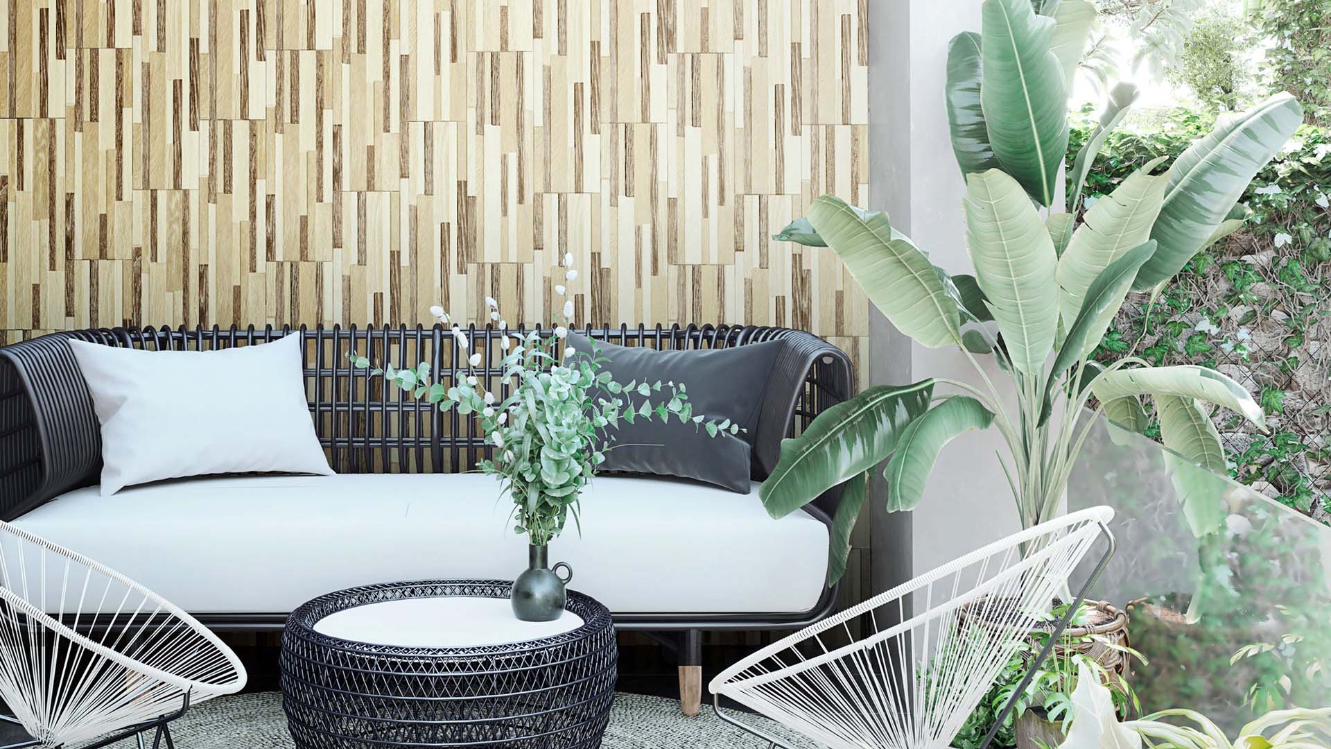 A welcoming balcony space with a comfy sofa and wood-effect tiles