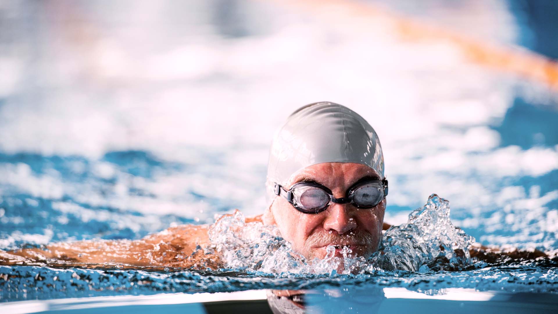 swimmer with goggles and swim cap