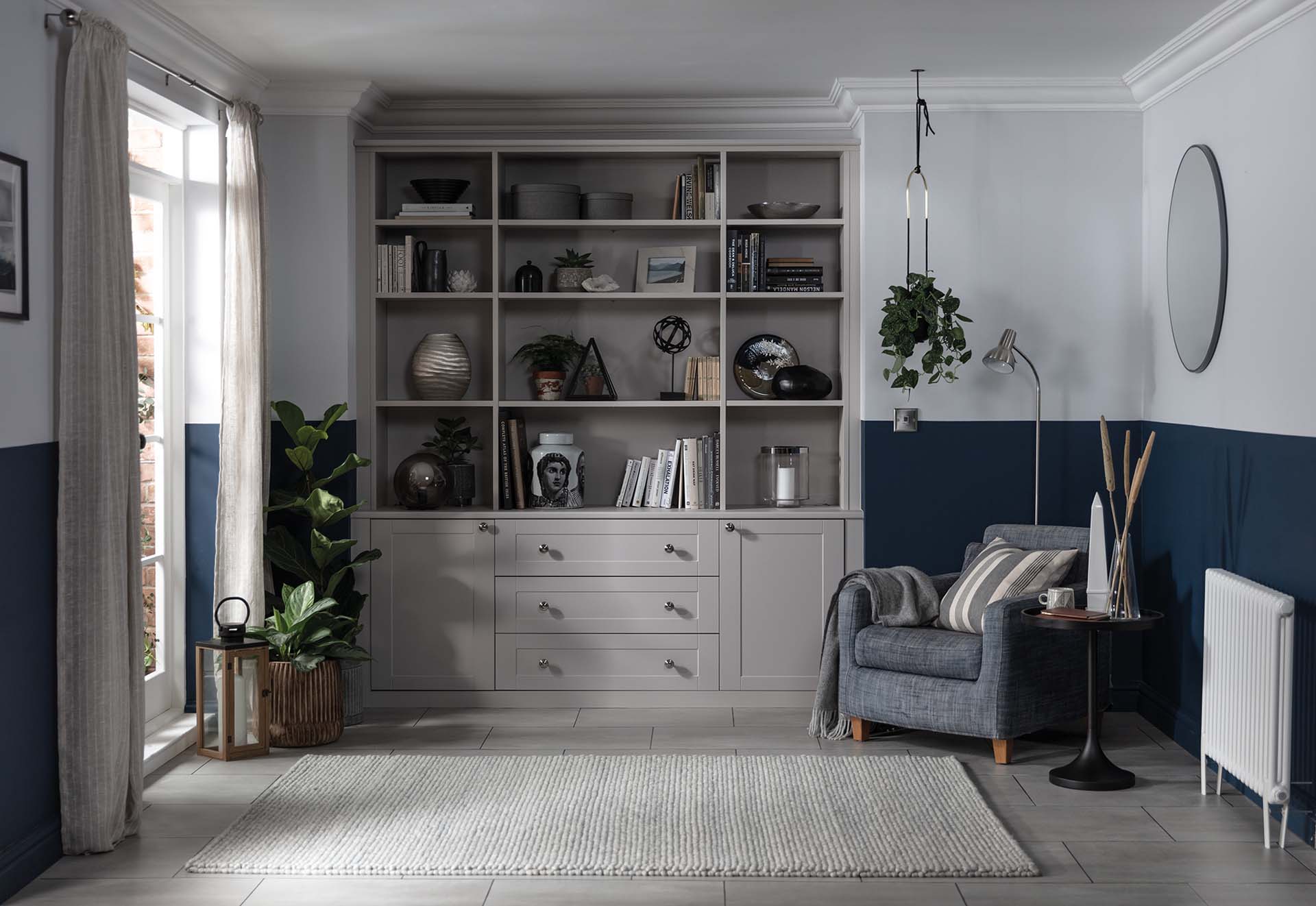 bespoke grey alcove bookshelves as storage in the lounge