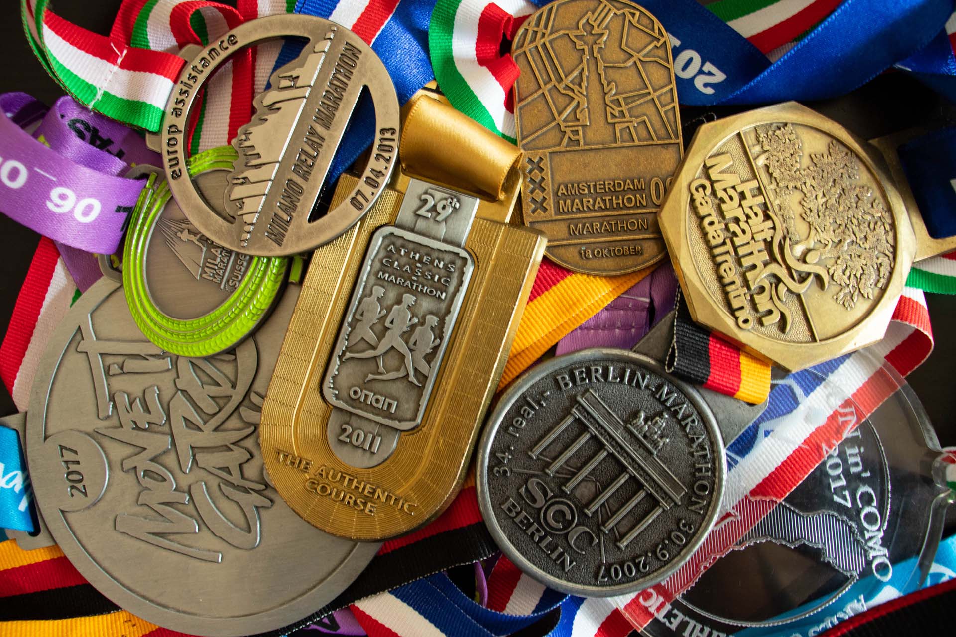 A collection of medals on ribbons