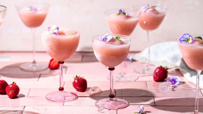 Strawberry and rose frose in elegant stemmed glasses