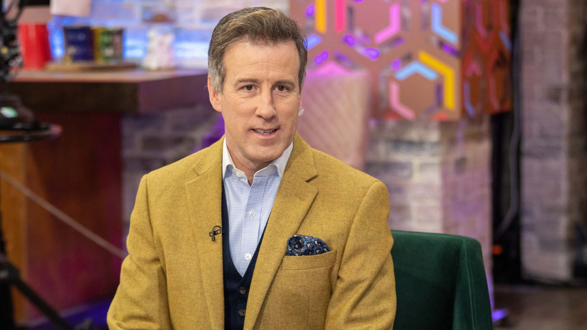 dancer Anton Du Beke wearing a camel coloured jacket