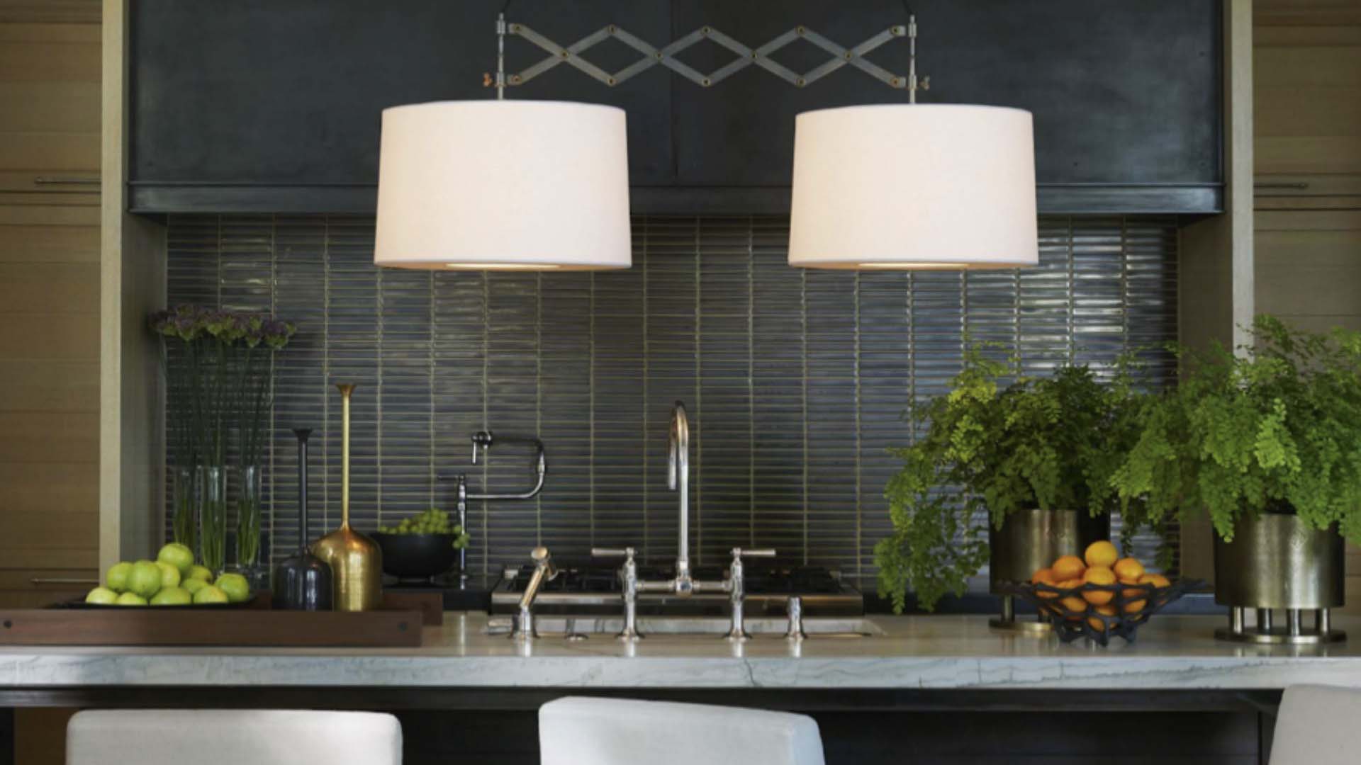 Bowls of fruit  on a kitchen bar