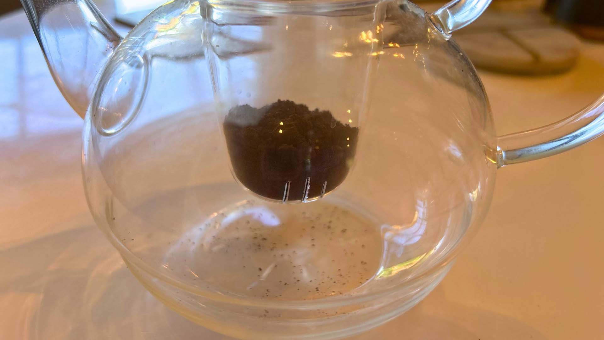 Coffee in an infuser teapot